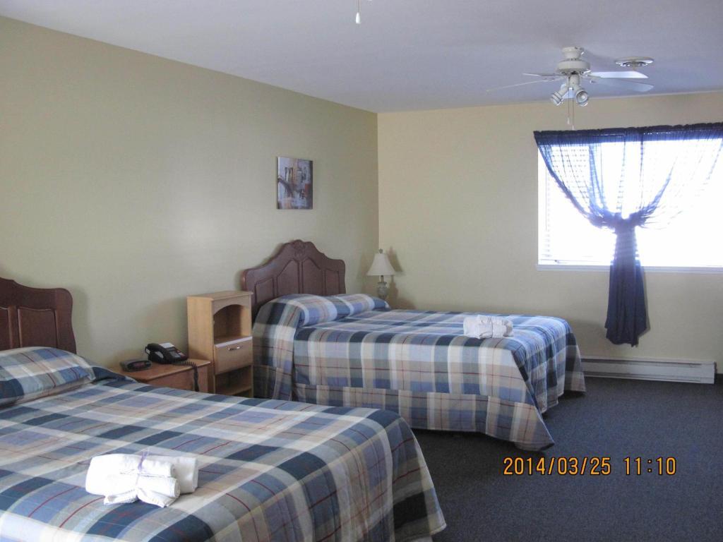 Motel Parc Beaumont Inc. Rum bild